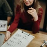 woman holding clipboard